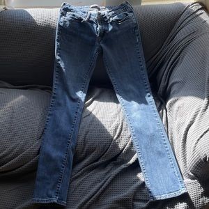 Levi’s blue jeans with a slight curve fit!